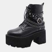 Schwarze Schnürstiefel mit hohem Absatz