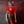 Large Screen Cyberpunk Helmet worn front on, blue pixel eyes with red fibres against a dark cloth