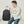 Black backpack with layered compartments and a wet and dry separation pocket