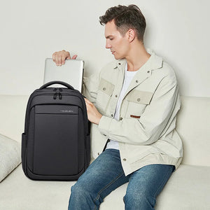Black backpack with layered compartments and a wet and dry separation pocket
