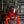 LED X Cyberpunk Helmet sötét ipari csövek előtt, piros LED X és egy kis X a szem felett