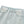 Close-up of the waistband, top button and zip fly of the light wash jeans, belt loops and a faded blue finish