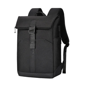Black roll top backpack closed by a magnetic clasp across the front