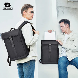 Black roll top backpack closed by a magnetic clasp across the front