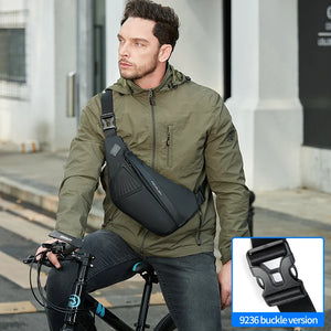 Slim black sling bag with a magnetic clasp and a wide chest strap