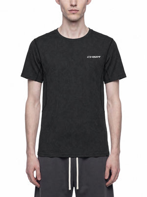 Man wearing the black Mesh Athletic T Shirt, front view with jacquard texture and white CYBER print