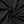 Swirl of the black stretch mesh fabric from the slim fit gym shirt, showing the jacquard texture