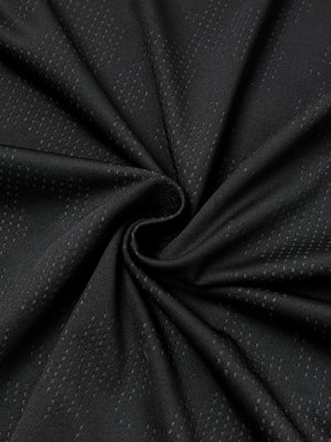 Swirl of the black stretch mesh fabric from the slim fit gym shirt, showing the jacquard texture