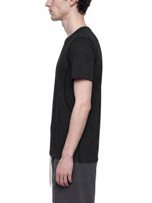Side view of a man in the black mesh gym shirt, close slim fit through the chest and short sleeves