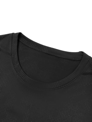 Close-up of the crew neck collar on the black mesh gym shirt, showing the dotted jacquard pattern