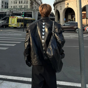 Black PU leather techwear jacket with metal spine detailing
