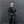 Black PU leather techwear jacket with metal spine detailing