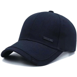 Plain black baseball cap with a small metal tag on the side panel