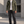 Military Field Jacket in olive green, worn open over a white tee with dark jeans, full front view