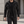 Military Field Jacket in black, worn open over a black tee, stand collar and chest flap pockets, front view