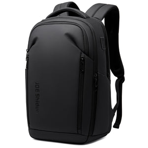 Black business backpack with several separate compartments and a padded back