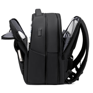 Black business backpack with several separate compartments and a padded back