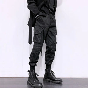 Pantalones negros elegantes con múltiples bolsillos