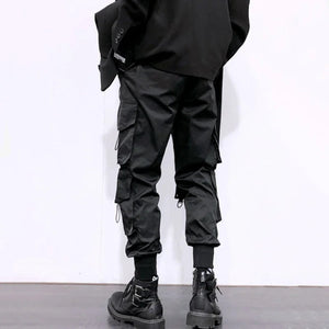 Pantalones negros elegantes con múltiples bolsillos