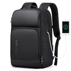Black nylon backpack with an external USB port and multiple front pockets