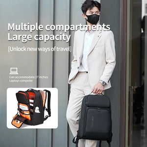Black nylon backpack with an external USB port and multiple front pockets