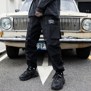 Pantalon noir à plusieurs fermetures éclair