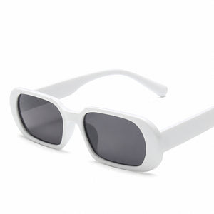 Narrow Retro Y2K Sunglasses, white frame with grey lenses, three-quarter view on white