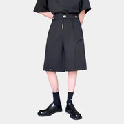 Nuevos y elegantes pantalones cortos con hebilla de metal oscuro