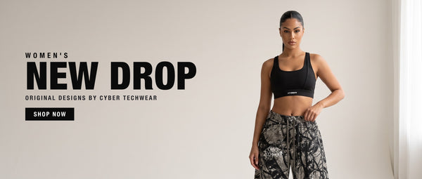 Women's new drop — model in a black Cyber sports bra and camo barrel-leg pants, Cyber Techwear original designs