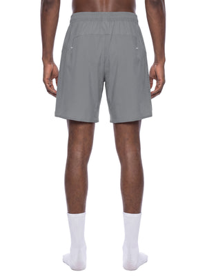 Back view of the Light Gray nylon athletic shorts on a model, elastic waist and back yoke seam