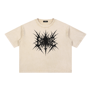 Light Apricot oversized graphic tee laid flat, front view of the black spiked print on the cream fabric