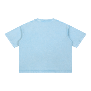 Sky Blue acid wash graphic tee laid flat from the back, plain faded back and relaxed boxy silhouette