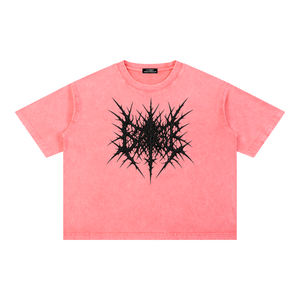 Pink oversized acid wash graphic tee laid flat, front view with the black thorn artwork on the chest