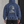Tył bluzy Royal Blue na modelu, nadruk z popękaną marmurową głową posągu i napisem AFTERHUMAN
