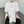 White and black padded shoulder oversized t shirt with double zippers