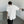 White and black padded shoulder oversized t shirt with double zippers