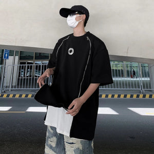White and black padded shoulder oversized t shirt with double zippers