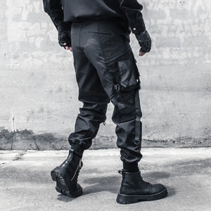 Black paratrooper cargo pants with webbing buckles