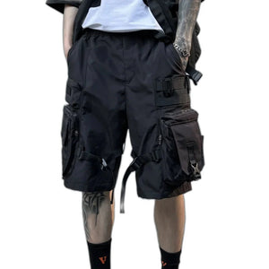 Black paratrooper techwear shorts with cargo pockets and straps