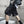 Black paratrooper techwear shorts with cargo pockets and straps