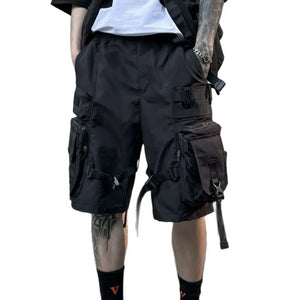 Black paratrooper techwear shorts with cargo pockets and straps