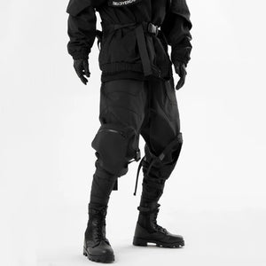 Pantalones negros con diseño de patchwork