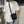 Black techwear sling bag with a dedicated phone pocket