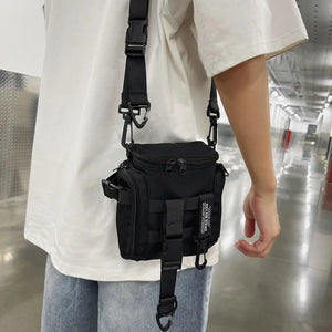 Black techwear sling bag with a dedicated phone pocket