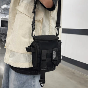 Black techwear sling bag with a dedicated phone pocket