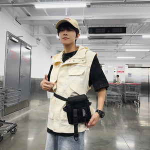 Black techwear sling bag with a dedicated phone pocket