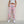 Front view of the Pink Camo Y2K Sweatpants with a white crop tee, pastel pink, blue and white camo print