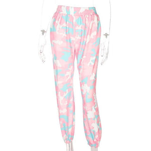 Pink and baby blue camo sweatpants on a mannequin, front view of the loose legs and gathered cuffs