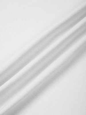 Close-up of the Light Gray polyester fabric folded in layers, showing the smooth knit surface