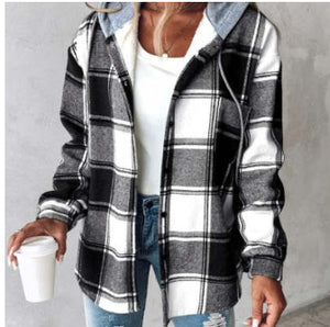 Black, white and grey plaid flannel jacket with a grey hood, front view worn open with jeans